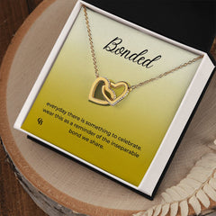 Interlocking Hearts Necklace (Yellow & White Gold Variants)