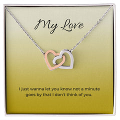 Interlocking Hearts Necklace (Yellow & White Gold Variants)