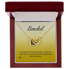Interlocking Hearts Necklace (Yellow & White Gold Variants)