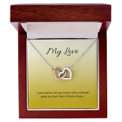 Interlocking Hearts Necklace (Yellow & White Gold Variants)